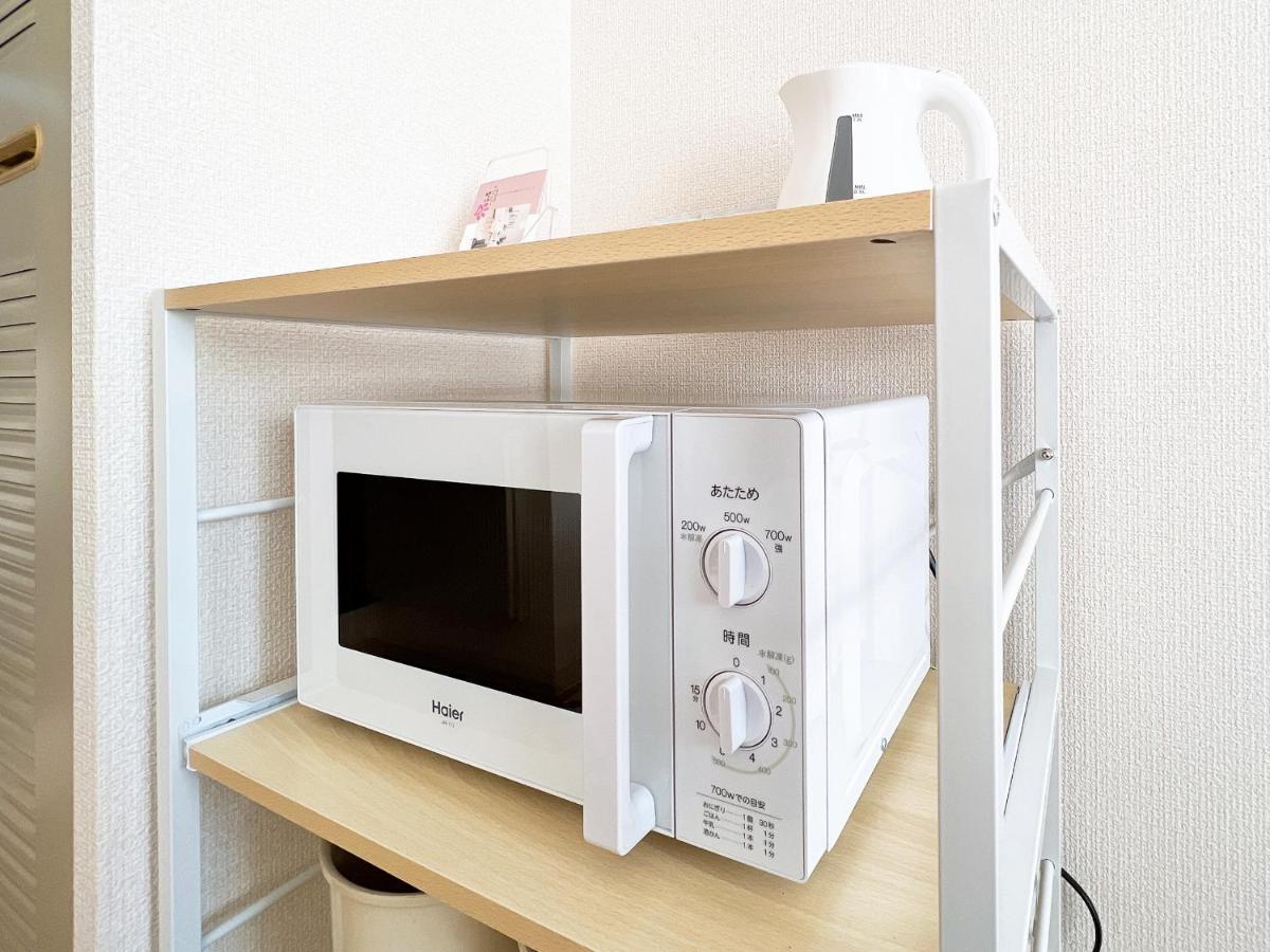 Ouchi Hotel Nishi-Tokaichi Hiroshima Buitenkant foto